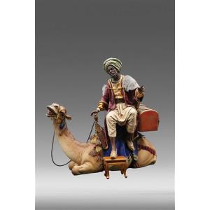 King moor on dromedary lying