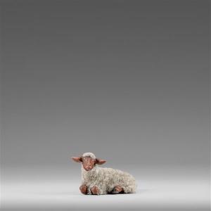 Sheep reclining with wool gray