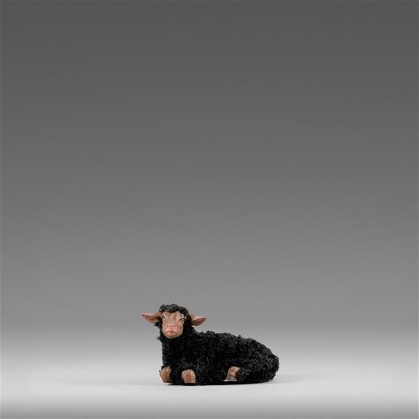 Oveja tumbada con lana negra - pintado